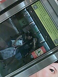 me and kaiting reflection at bugis MRT station..