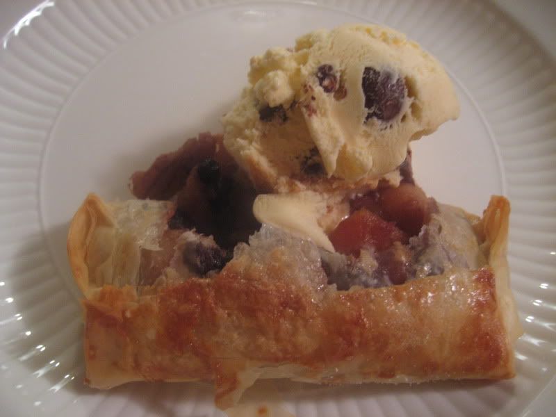 apple berry filling in browned pie with ice cream