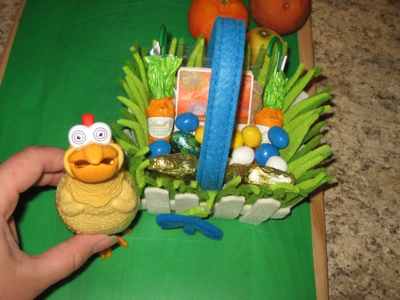 felt easter basket with candy and toy chicken