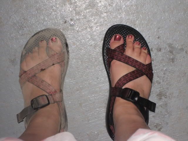 my feet in Chaco sandals after climbing Mt Wittenberg and cleaning the residual dust off one foot