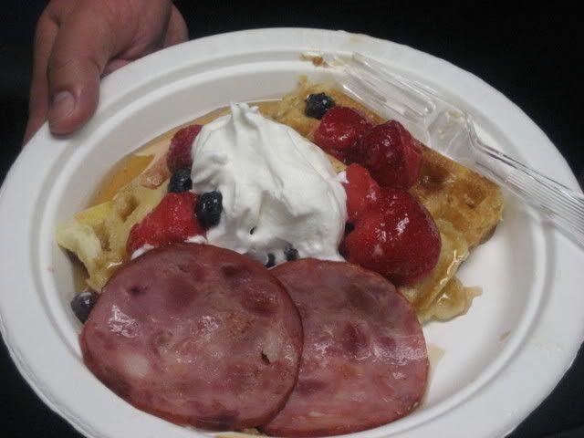 waffles with blueberries and strawberries and cream and ham