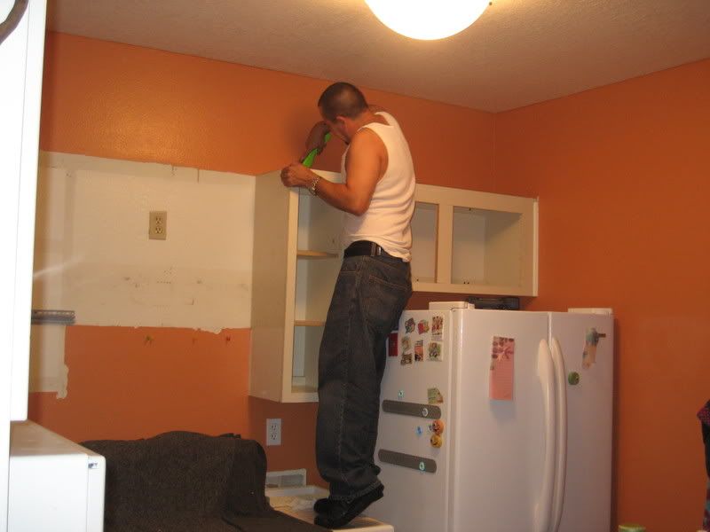 J detaching kitchen cabinets