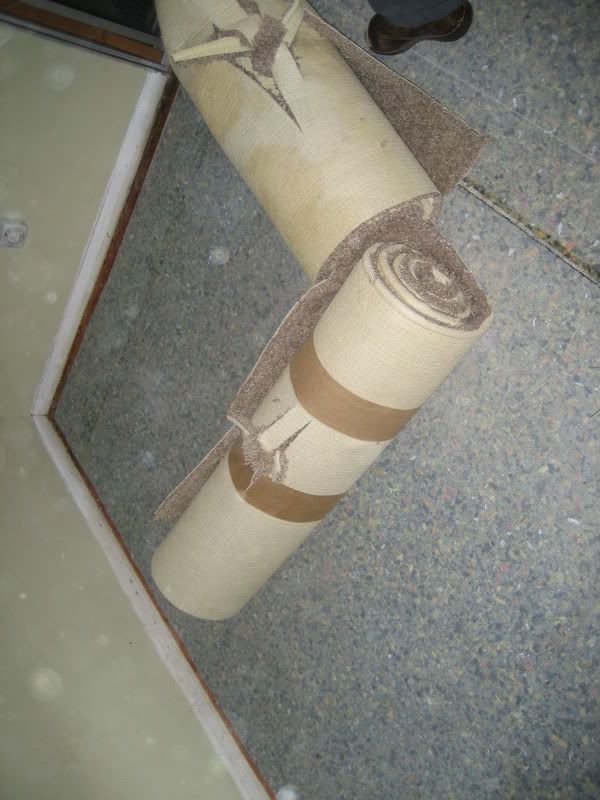 two carpet rolls with knots