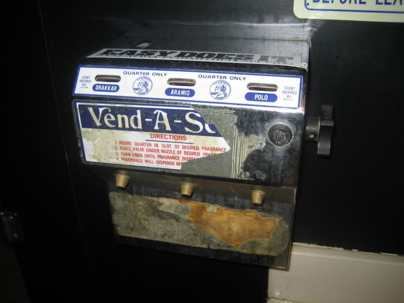 rusty, raggedy looking vending machine