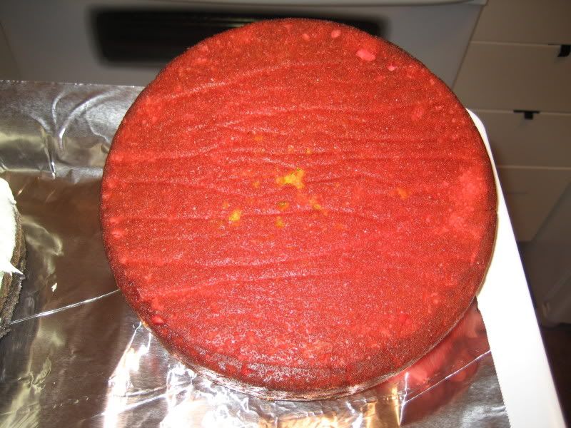 Rainbow Cake red bottom looks tastier than top