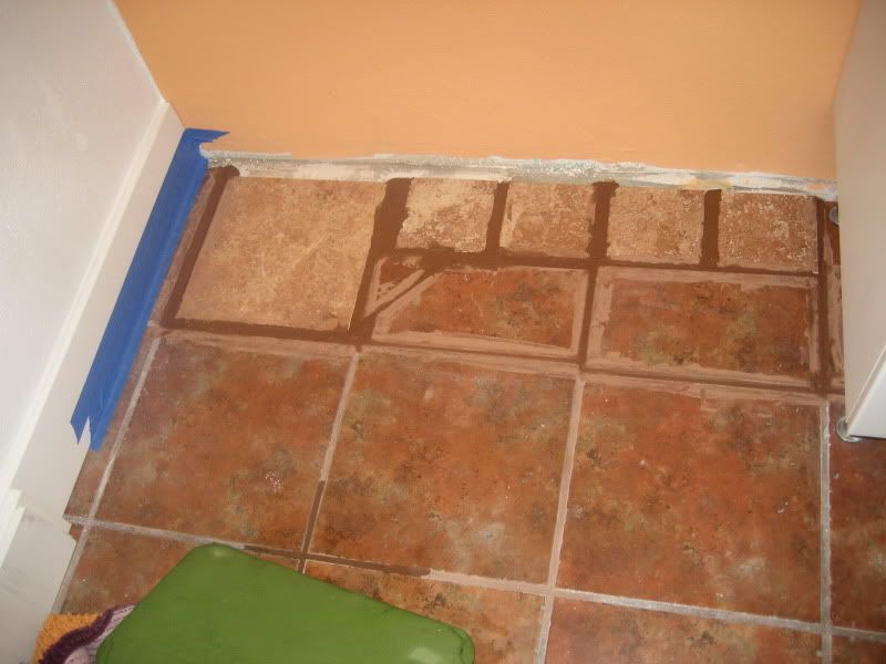 bath vanity mismatched and slightly offset tiling