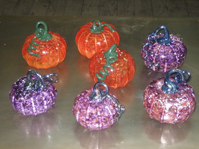 7 Glass Pumpkins on marver