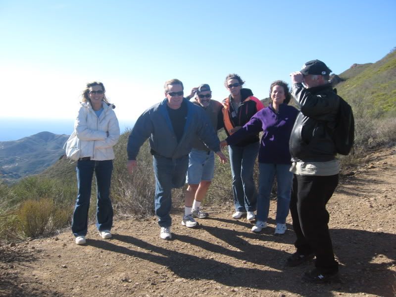 Wind blowing at colleagues on Mt. Boney