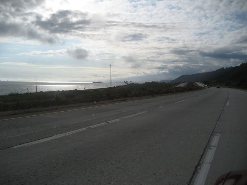 more road and water and sky