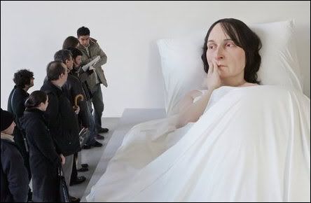 Artist Ron Mueck creates giant hyper-realistic sculptures.