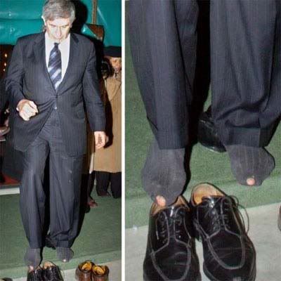 Paul Wolfowitz leaving a mosque, his toes are now officially on the Homeland Security Watch List.